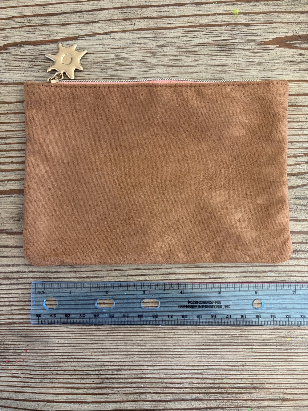 ipsy Suede Zip Clutch in Tan with Sun Charm